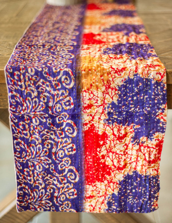 Dignify Cotton Table Runner in Cotton Kantha on a table
