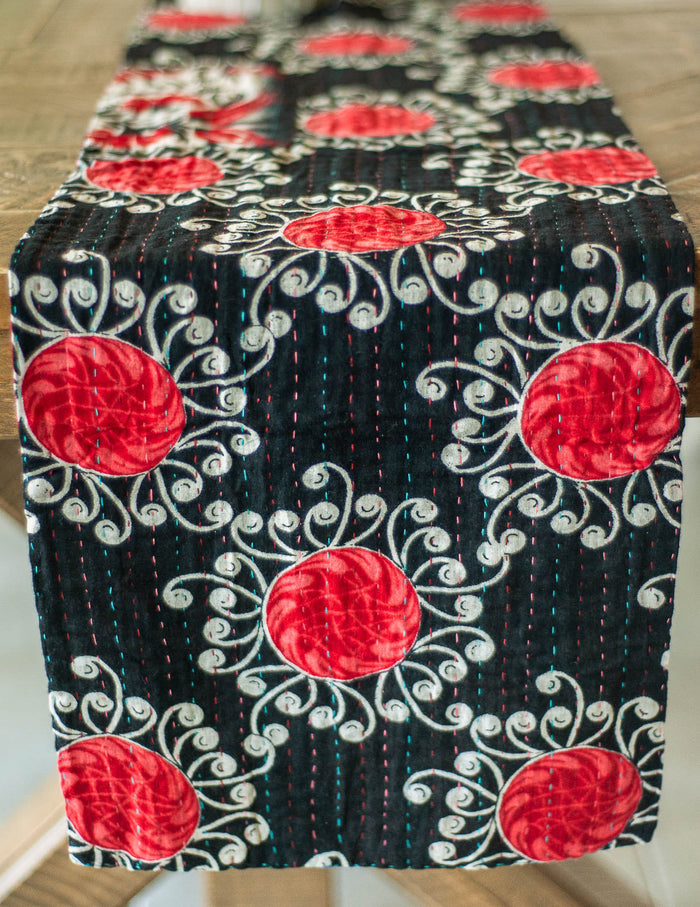 Dignify Cotton Table Runner in Cotton Kantha on a table