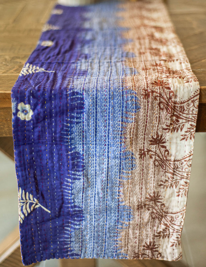 Dignify Cotton Table Runner in Cotton Kantha on a table