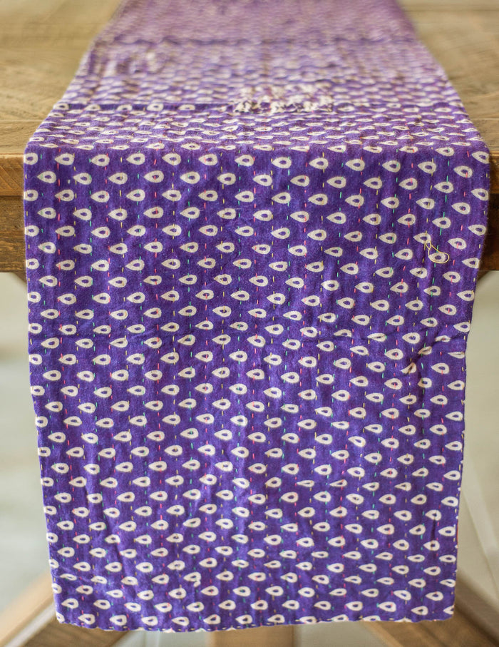 Dignify Cotton Table Runner in Cotton Kantha on a table