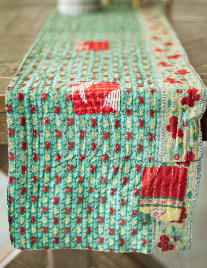 Dignify Cotton Table Runner in Cotton Kantha on a table