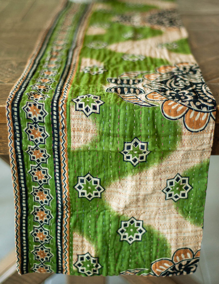 Dignify Cotton Table Runner in Cotton Kantha on a table