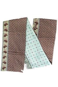 Dignify Cotton Table Runner in Cotton Kantha on a table