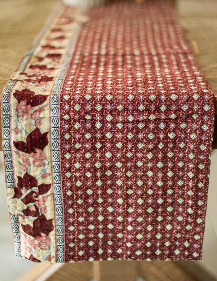 Dignify Cotton Table Runner in Cotton Kantha on a table