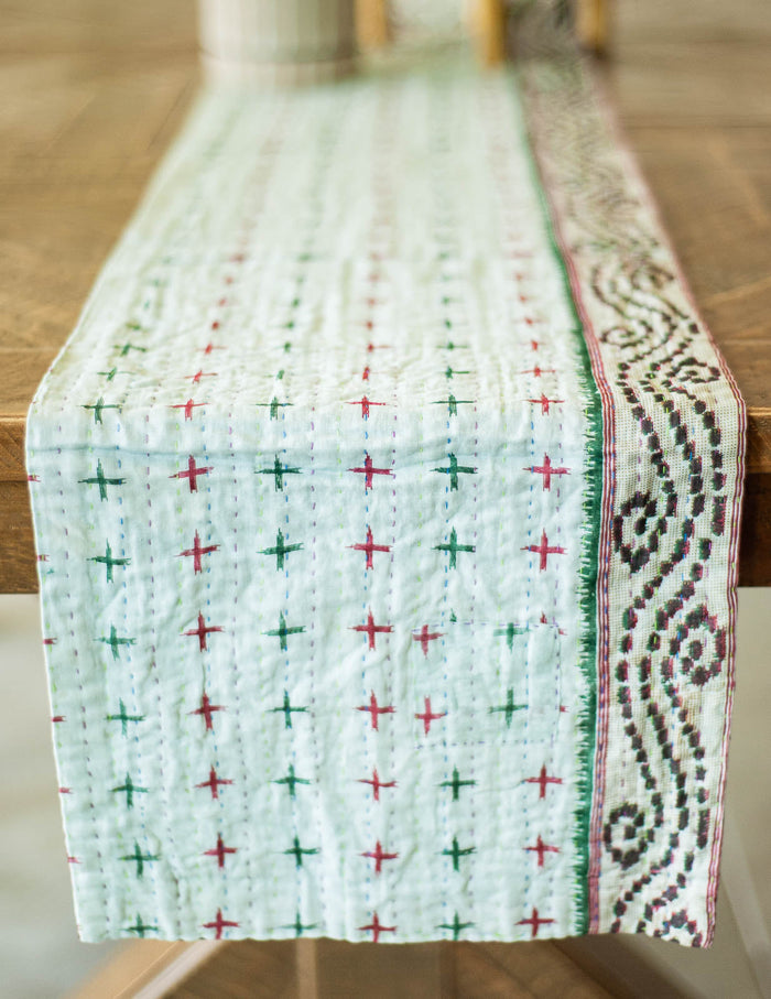 Dignify Cotton Table Runner in Cotton Kantha on a table