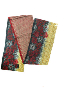 Dignify Cotton Table Runner in Cotton Kantha on a table