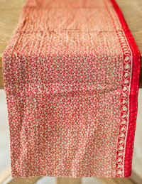 Dignify Cotton Table Runner in Cotton Kantha on a table
