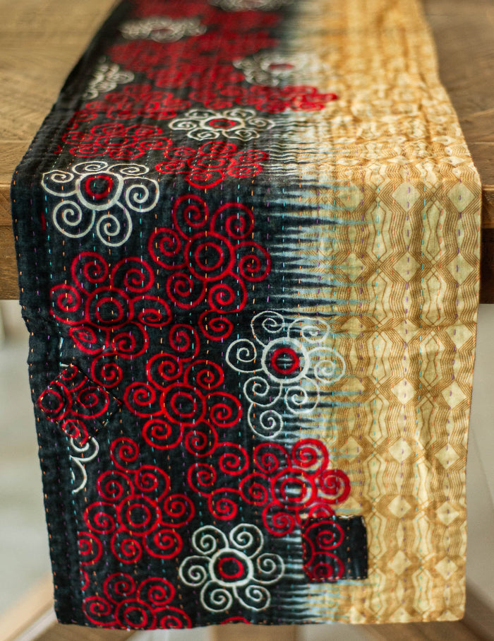 Dignify Cotton Table Runner in Cotton Kantha on a table