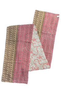Dignify Cotton Table Runner in Cotton Kantha on a table