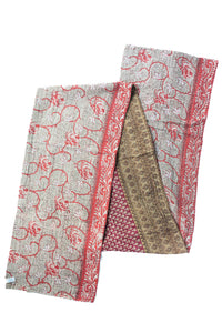 Dignify Cotton Table Runner in Cotton Kantha on a table